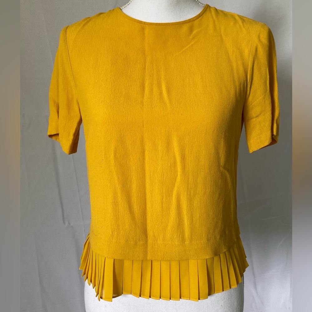 Yellow top with pleaded hem